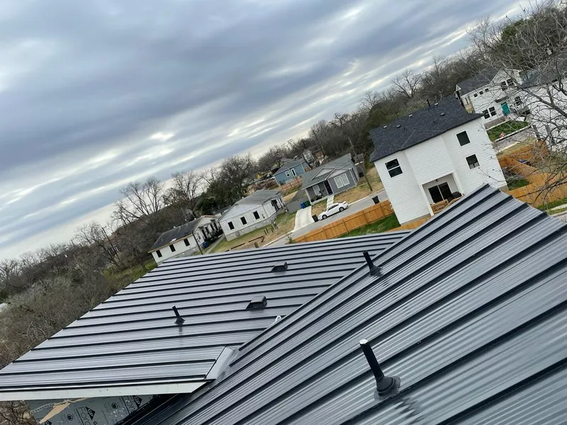 Standing seam metal roof panels with vents for Skylight Repair in Frankfort